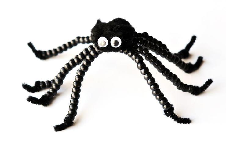 Some pipe cleaners, a black pompom, googly eyes, and pony beads are all it takes to make this sweet and cuddly beaded Halloween spider. Perfect for a low-mess craft to do together before heading out for an afternoon of errands (plus this way there's a new friend to take along for the ride). 
