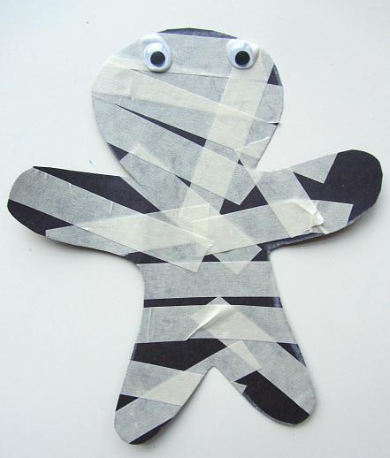 This spooky masking tape mummy is a great Halloween craft to keep kids busy and happy while dinner's being prepped or there's an important phone call to be made. 