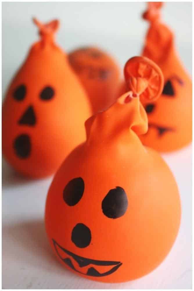 The awesome thing about these pumpkin stress balls is that they can be filled with any small sensory item that's hanging around: rice, unpopped popcorn kernels, buttons, playdough, small beads. They're great for handing to kids who need a little help calming down (or for when mom or dad can use a little help finding their inner Zen).  