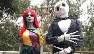 A couple wearing a Jack Skellington and Sally halloween costume