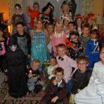 children in their costumes for a Halloween party
