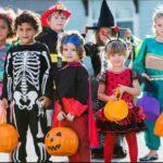 a group of kids wearing their Halloween costumes