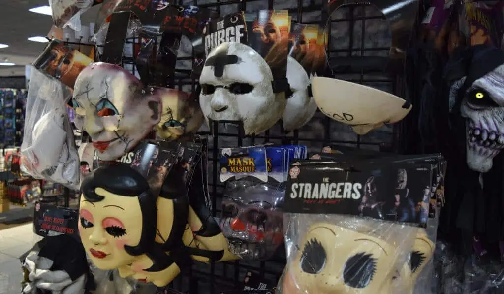 Halloween face masks displayed at a store